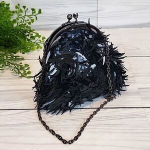 Franchi black sequined mini clutch with chain